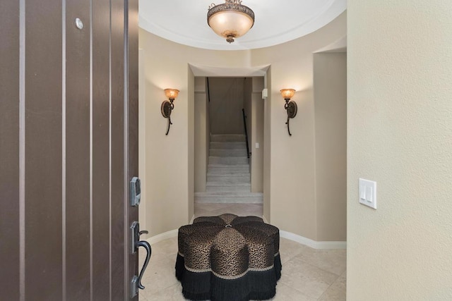 hallway with light tile patterned floors