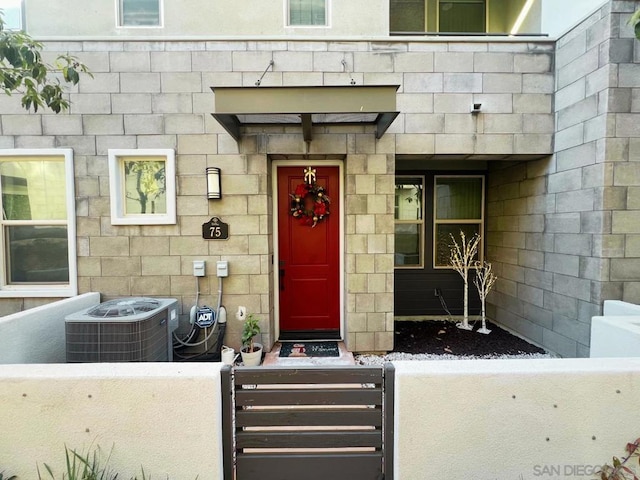 property entrance with cooling unit