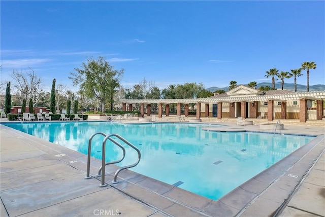 view of swimming pool featuring a patio