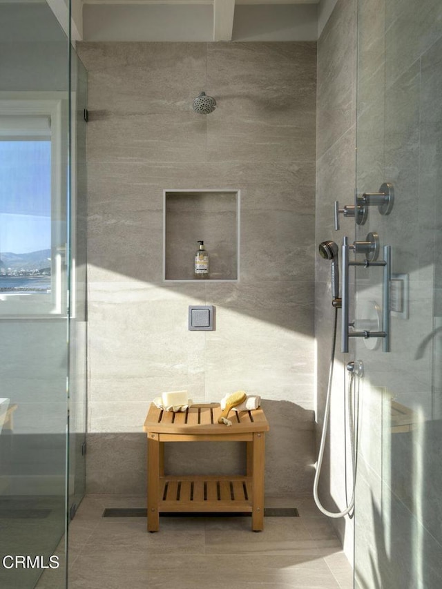 bathroom featuring an enclosed shower