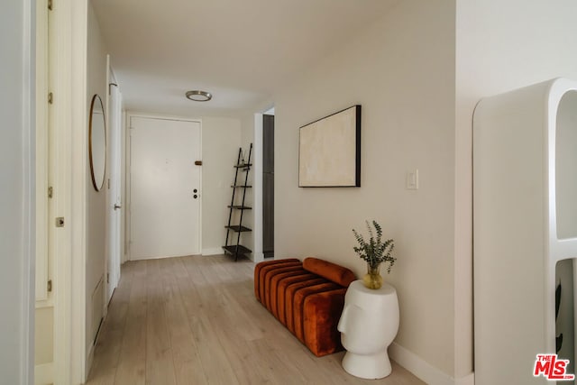 corridor featuring light hardwood / wood-style flooring