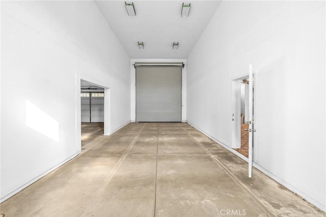 corridor with concrete flooring