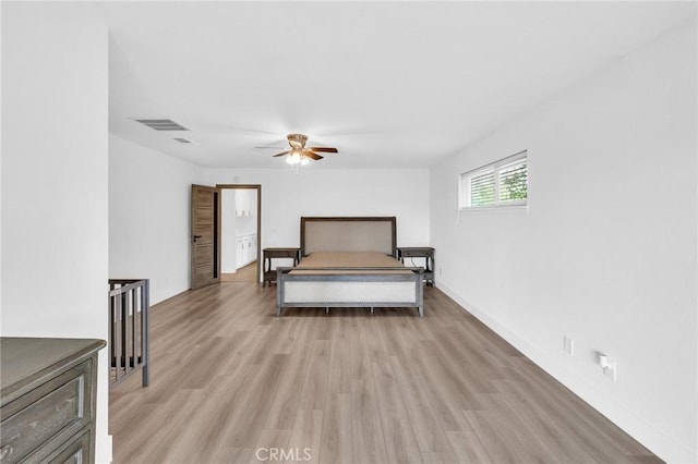 bedroom with light hardwood / wood-style flooring