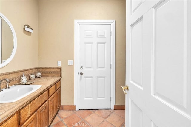 bathroom featuring vanity and tile patterned floors