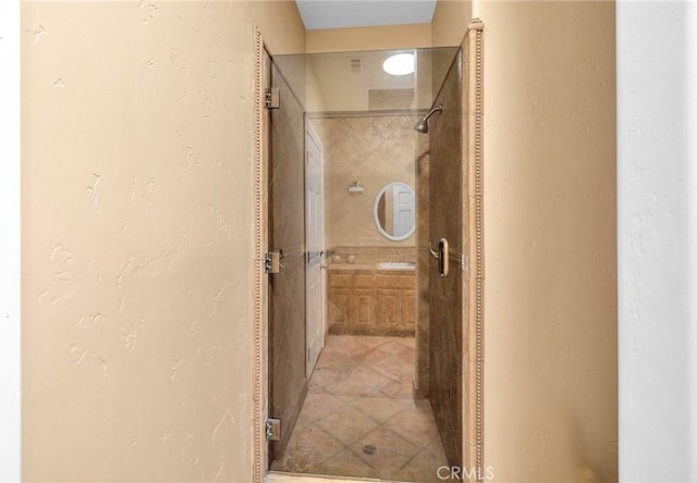 bathroom with a shower