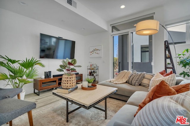 living room featuring light hardwood / wood-style flooring