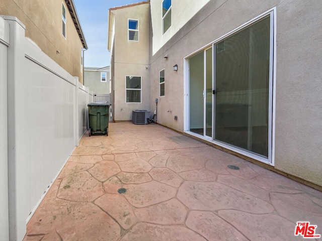 view of patio with central AC