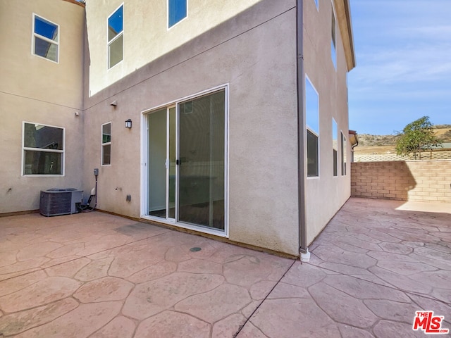 view of patio with central AC unit