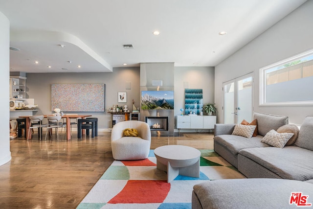 living room with hardwood / wood-style floors