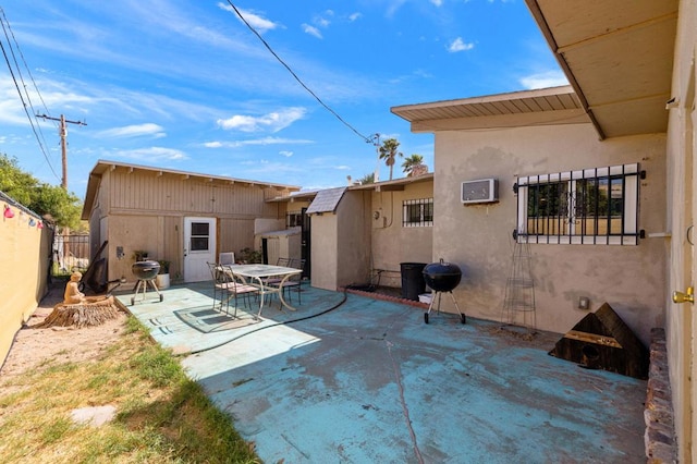 rear view of house featuring a patio area