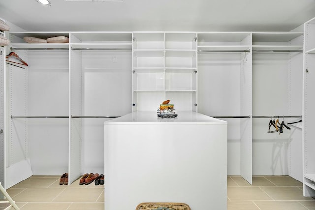 spacious closet featuring washer / dryer