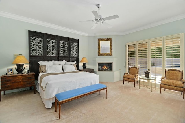 bedroom with light carpet, ceiling fan, and ornamental molding