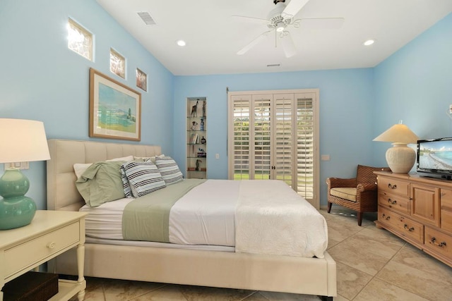 tiled bedroom with ceiling fan