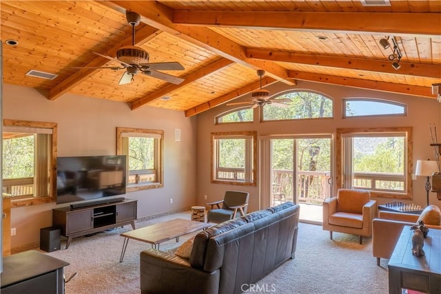 carpeted living room with vaulted ceiling with beams, ceiling fan, and wooden ceiling