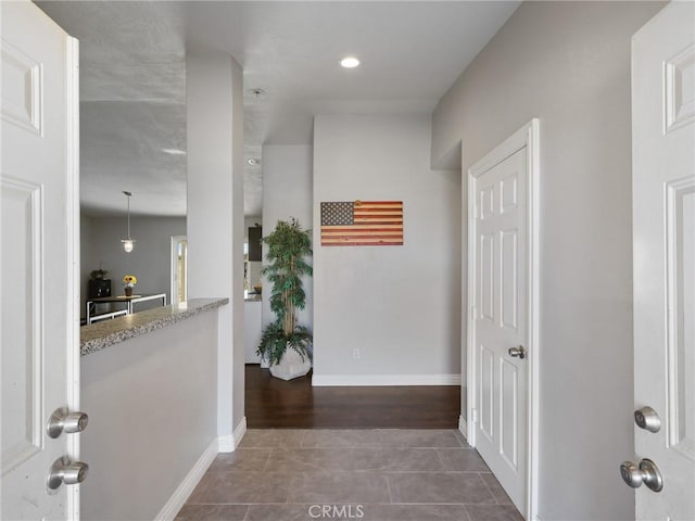 7755 7th St, Phelan, CA 92371 - corridor with tile patterned flooring, baseboards, and recessed lighting
