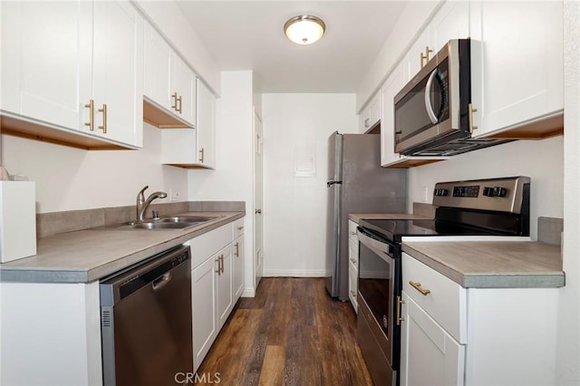 kitchen featuring sink, white cabinets, and stainless steel appliances