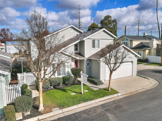 view of front of property with a front lawn and a garage