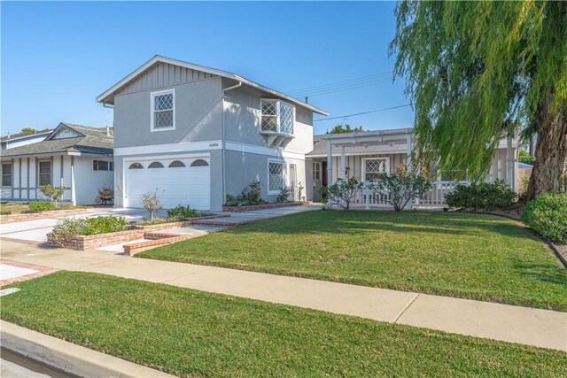 front facade featuring a garage and a front lawn