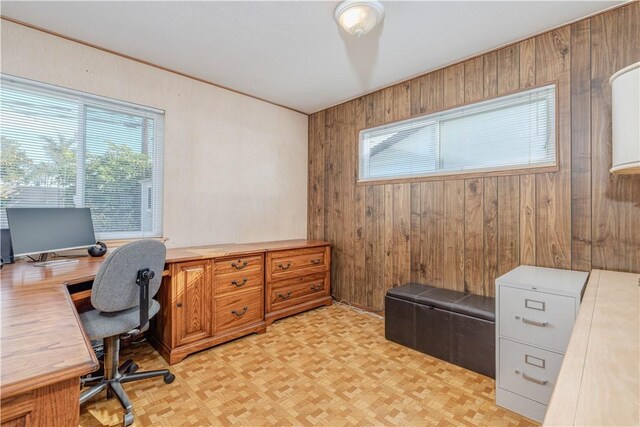 home office with wood walls