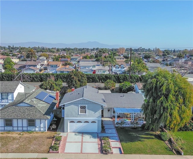 aerial view with a mountain view and a residential view