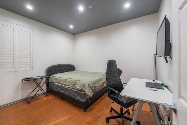 bedroom featuring hardwood / wood-style flooring