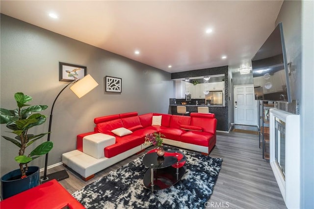 living room featuring dark wood-type flooring