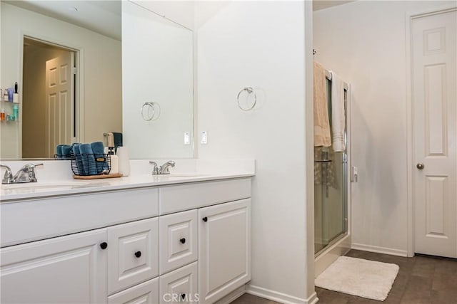 bathroom featuring vanity and walk in shower