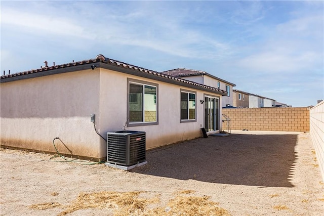 view of home's exterior with central air condition unit