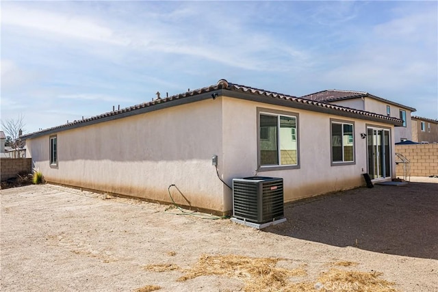 view of home's exterior featuring central AC unit