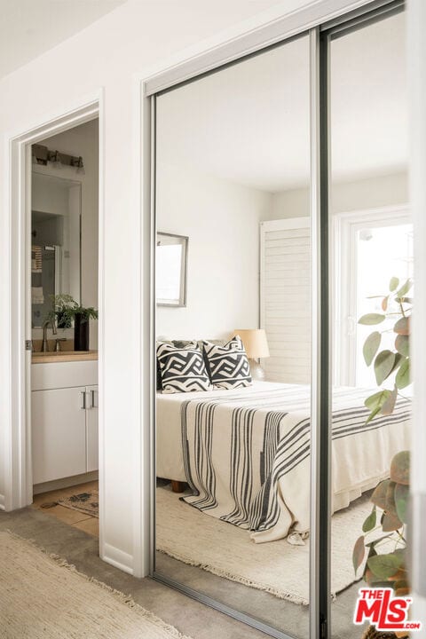 bedroom featuring ensuite bathroom