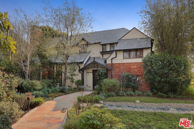 view of tudor-style house