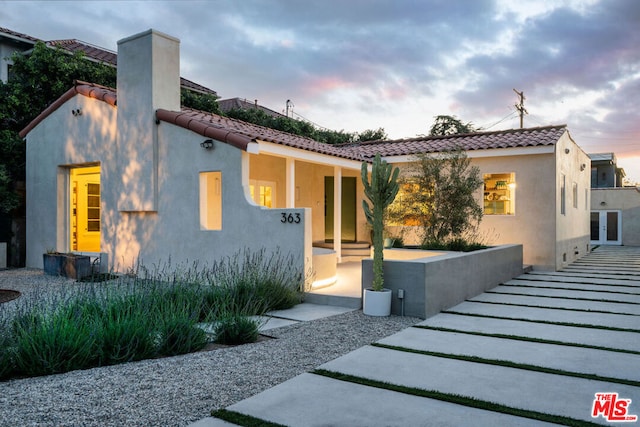 view of front facade featuring french doors