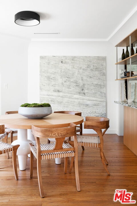 dining area featuring light wood-type flooring