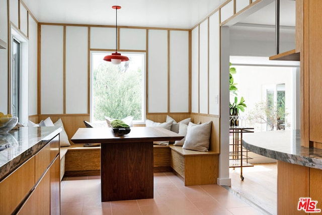 tiled dining space with breakfast area