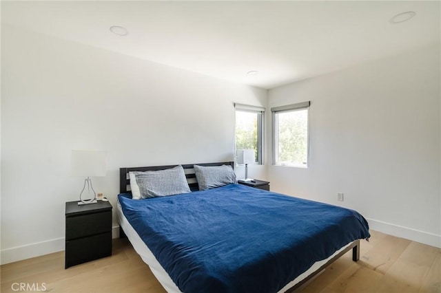 bedroom featuring light hardwood / wood-style flooring