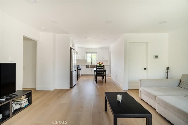 living room featuring light hardwood / wood-style flooring