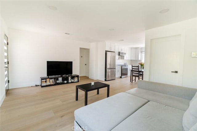 living room featuring light hardwood / wood-style flooring