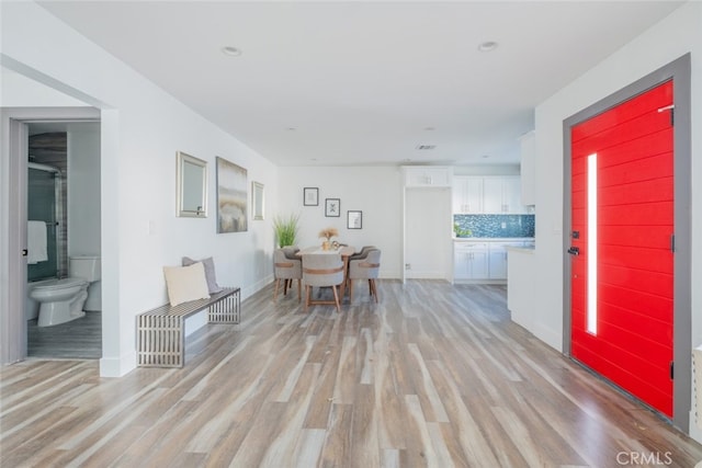 foyer featuring light wood-type flooring