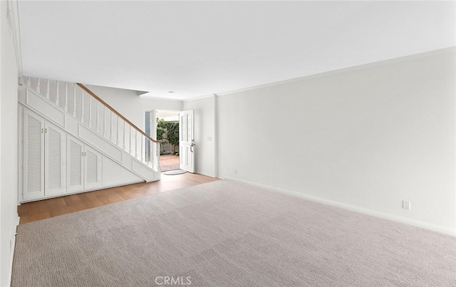 unfurnished living room with light hardwood / wood-style floors