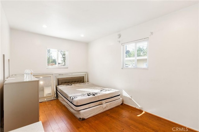 bedroom featuring hardwood / wood-style floors