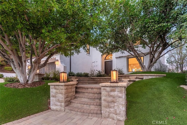 view of front of house with a front lawn