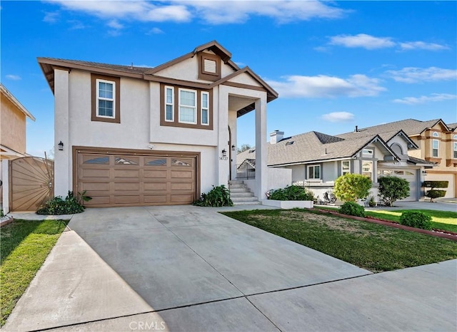 view of front facade featuring a garage and a front lawn