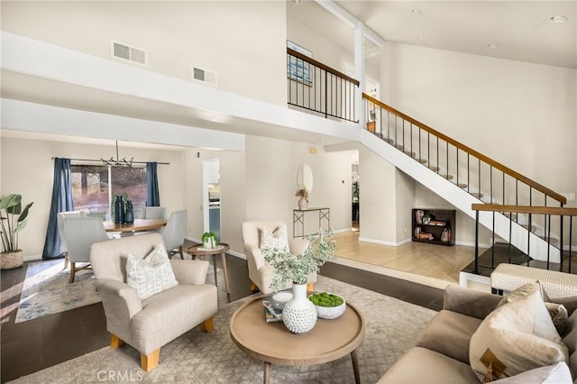 living room featuring a notable chandelier