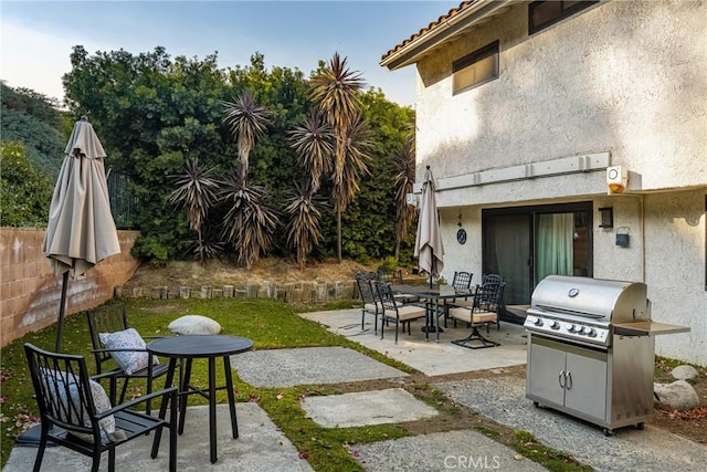 view of patio / terrace featuring a grill