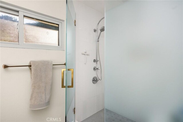 bathroom featuring walk in shower