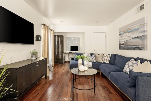 living room with dark wood-type flooring