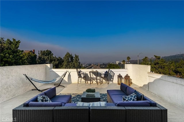 patio terrace at dusk with outdoor lounge area