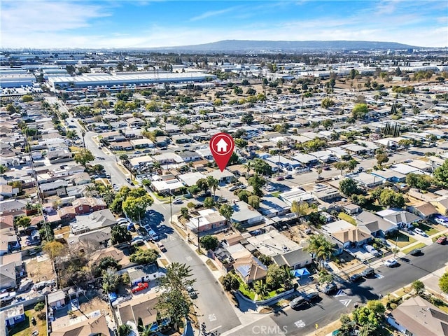 bird's eye view featuring a mountain view and a residential view