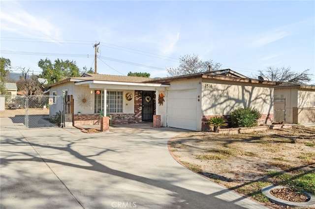 view of front of home with a porch and a garage