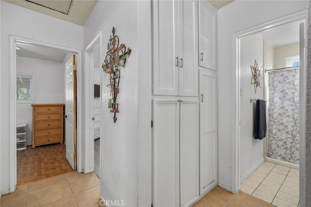 1538 W 15th St, San Bernardino, CA 92411 - hall with light tile patterned floors and baseboards